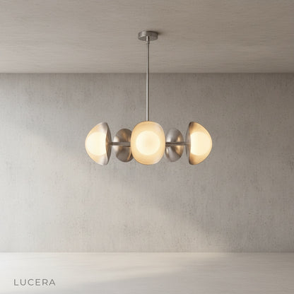 Close-up of Lambrusco Chandelier smooth glass sphere and solid brass joint detail