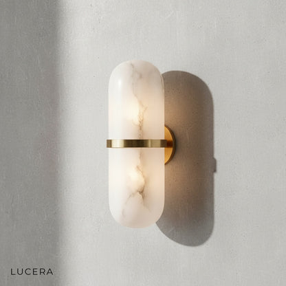 Tricolor LED wall lamp showing warm glow in cozy bedroom setting