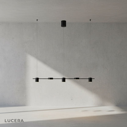 Rind black and gold linear pendant lamp in contemporary kitchen setting
