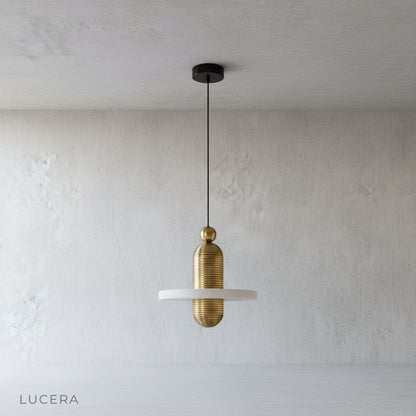 fluted aluminum frame detail on Marianist pendant light against neutral backdrop