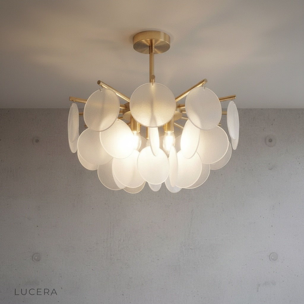 gold finished iron frame detail with textured glass pendant lights