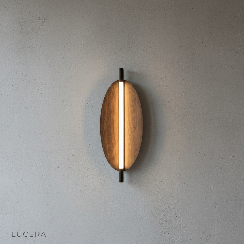 Rise sconce in warm ambient light casting even illumination on textured plaster wall