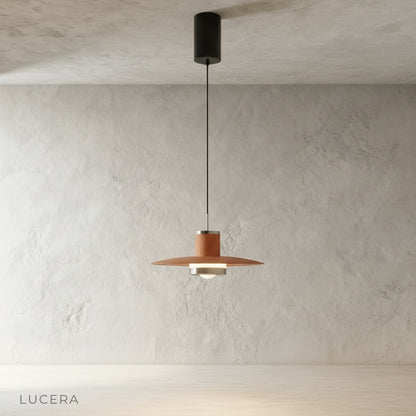 zarzuela pendant light illuminating dining table in contemporary dining room