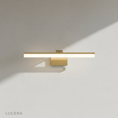 close-up of iron joint and acrylic diffuser on balance wall lamp