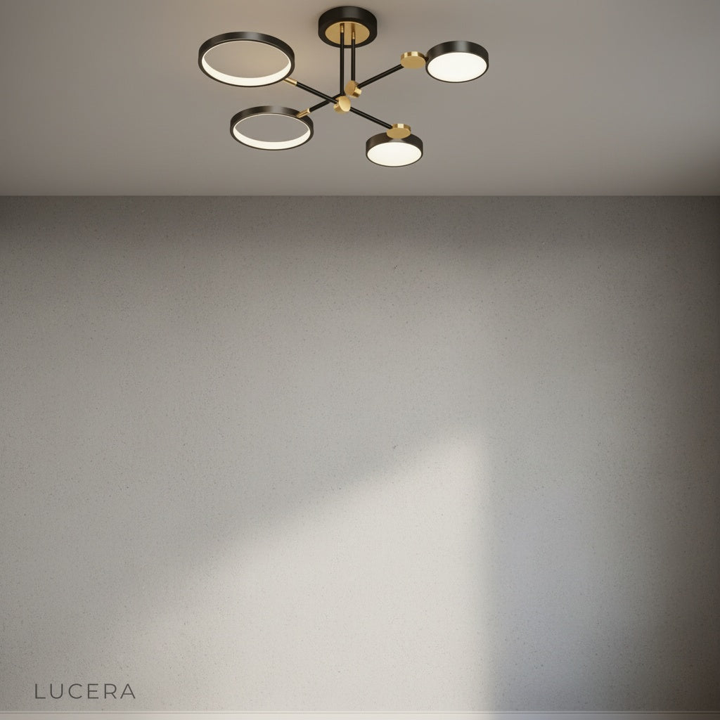 Yin-yang ceiling light in matte black finish with gold accent ring for contemporary interiors