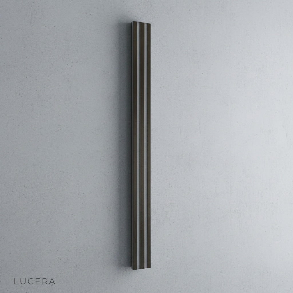 Close-up of Hesperus wall lamp acrylic shade texture and black metal arm detail