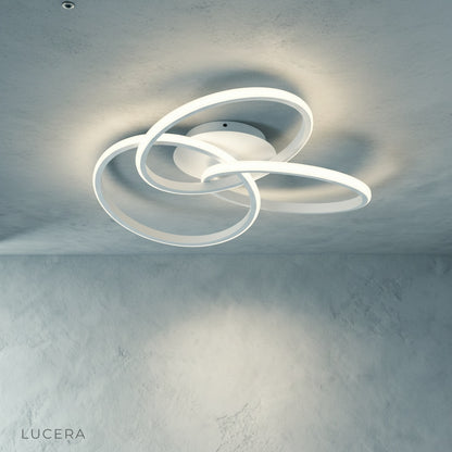 Close-up of Loom ceiling light textured iron shade and aluminum details