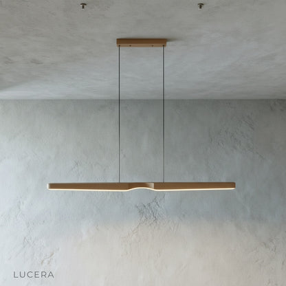 Ember wood pendant light in natural oak finish suspended from ceiling in bright studio lighting