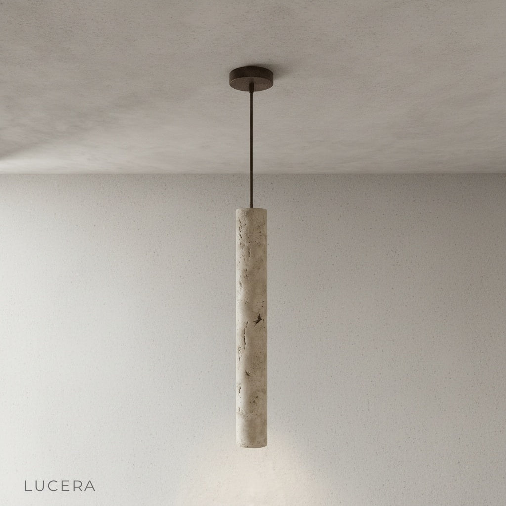 Triumph pendant light illuminating kitchen island with soft directional light
