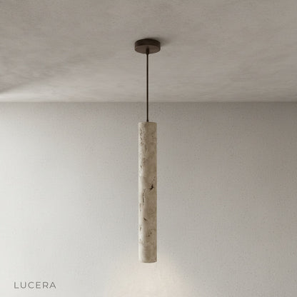 Triumph pendant light illuminating kitchen island with soft directional light