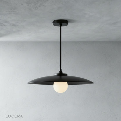 Sylvaine pendant light illuminating a kitchen island with warm ambient glow