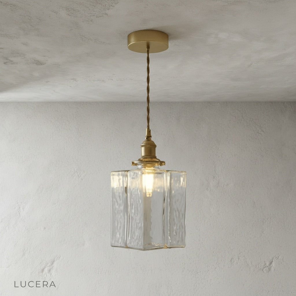 Tucana pendant light in bright gallery setting with contemporary art