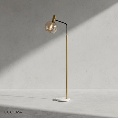 Cerise Gold Glass lamp angled view showing sculptural silhouette