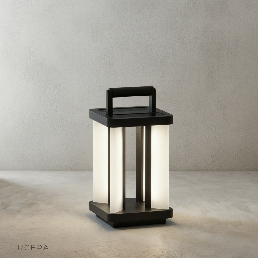 black finish Unction Outdoor Lamp mounted beside a modern patio door