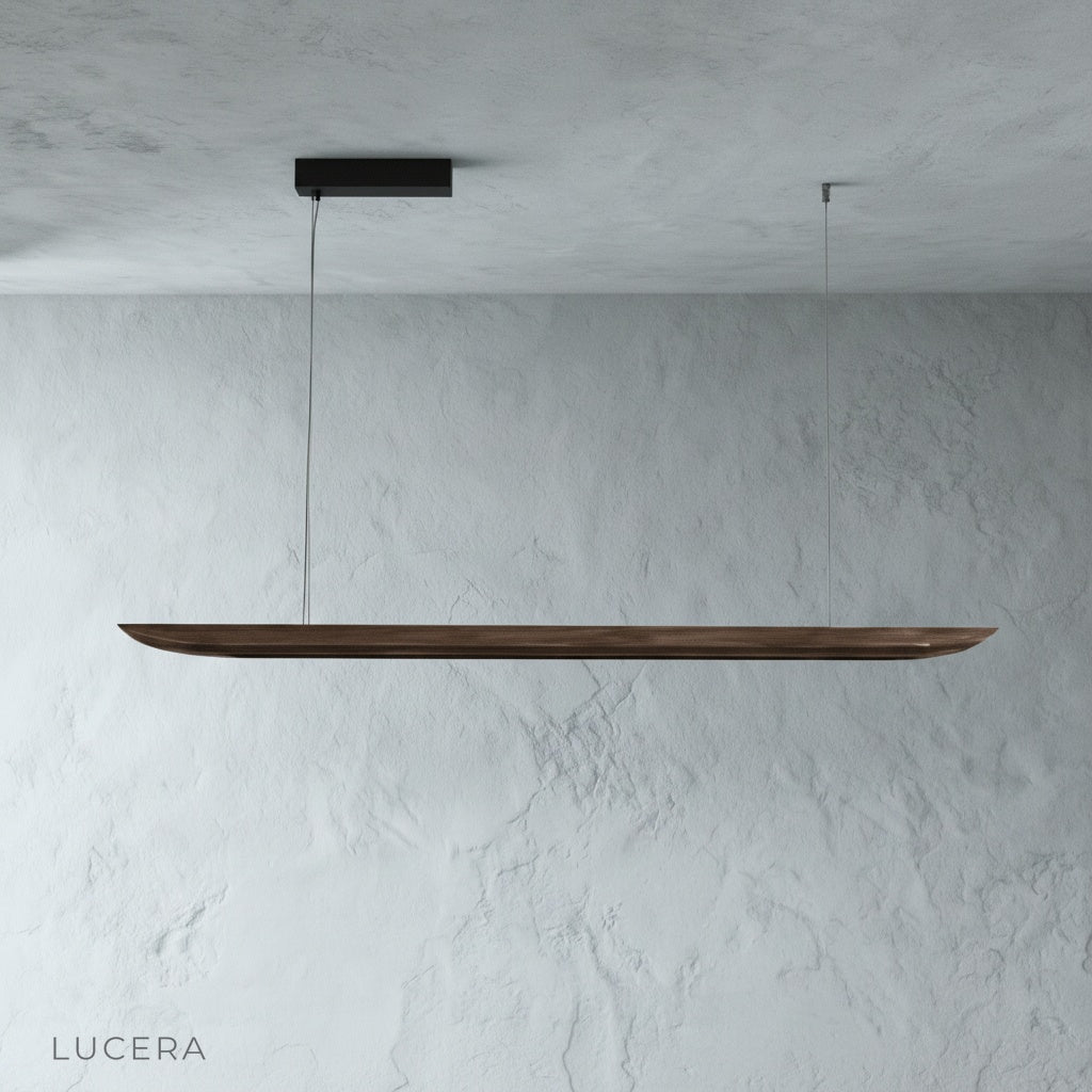 Fauvist pendant light hanging above a cozy office desk with warm ambient light and soft shadows