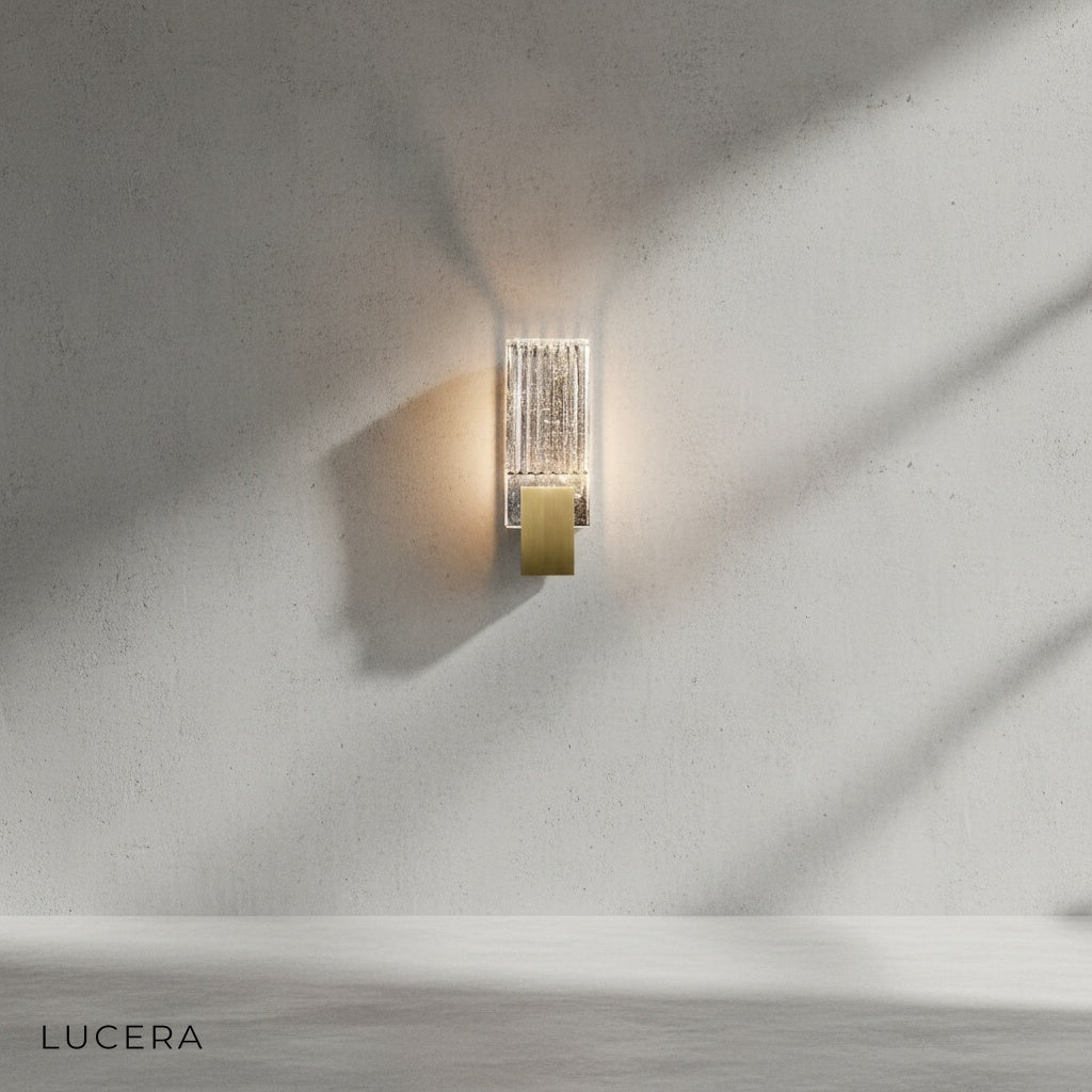Slargando wall light in stairway corridor casting sparkling reflections on wall