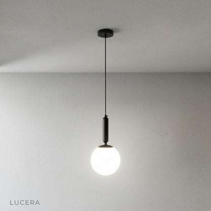 Yvaine pendant light in bright kitchen over island highlighting work area