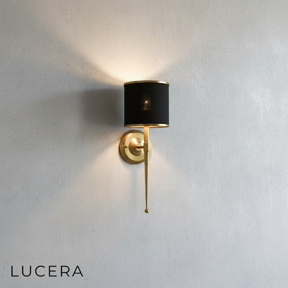 Morendo wall sconce in contemporary hallway accent wall with warm ambient lighting