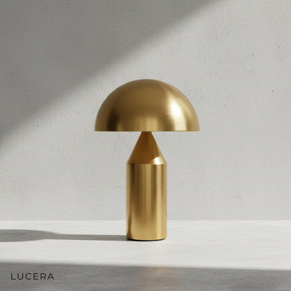 Gold and black Realta table lamp variants side by side in bright studio setting