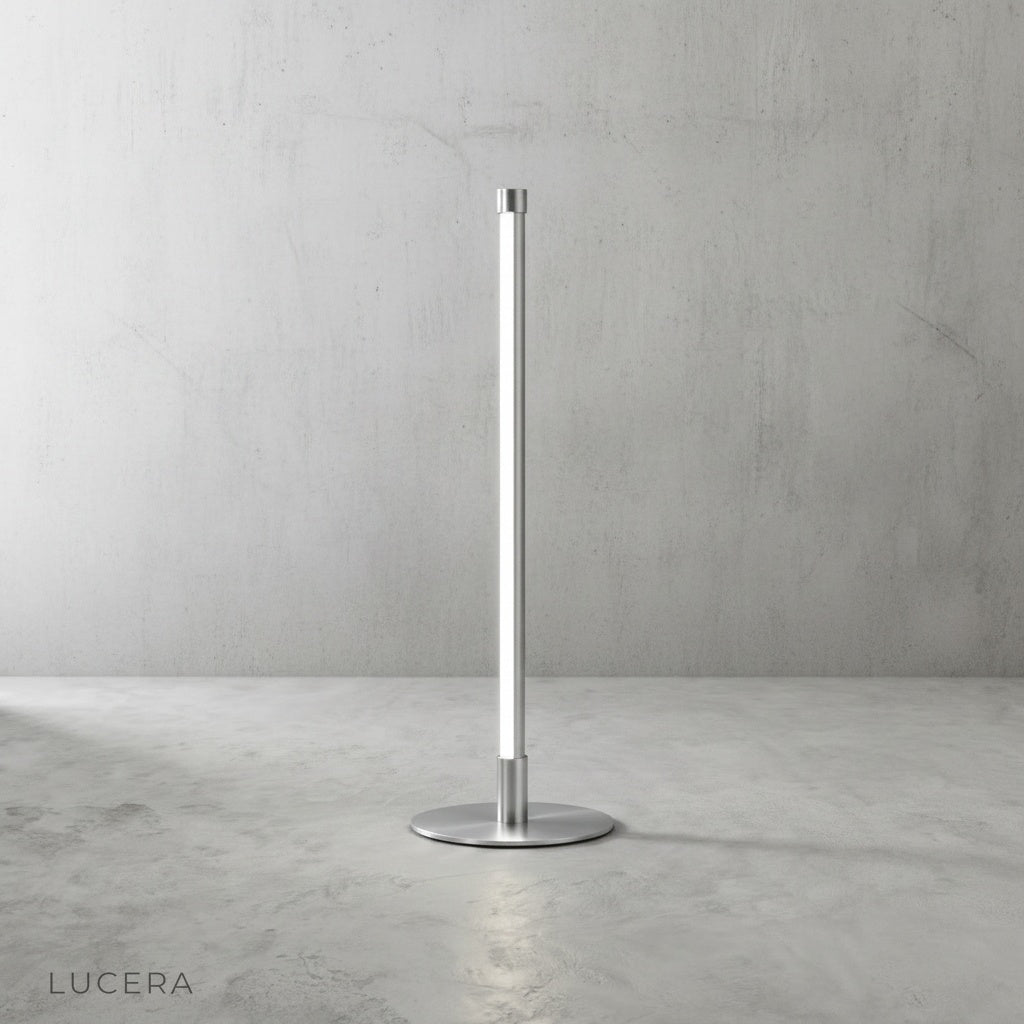Pascal Table Lamp in matte finish against a soft beige wall, ambient light casting a halo