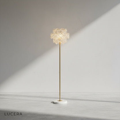 black marble base floor lamp with sunstone crystal details against white studio backdrop