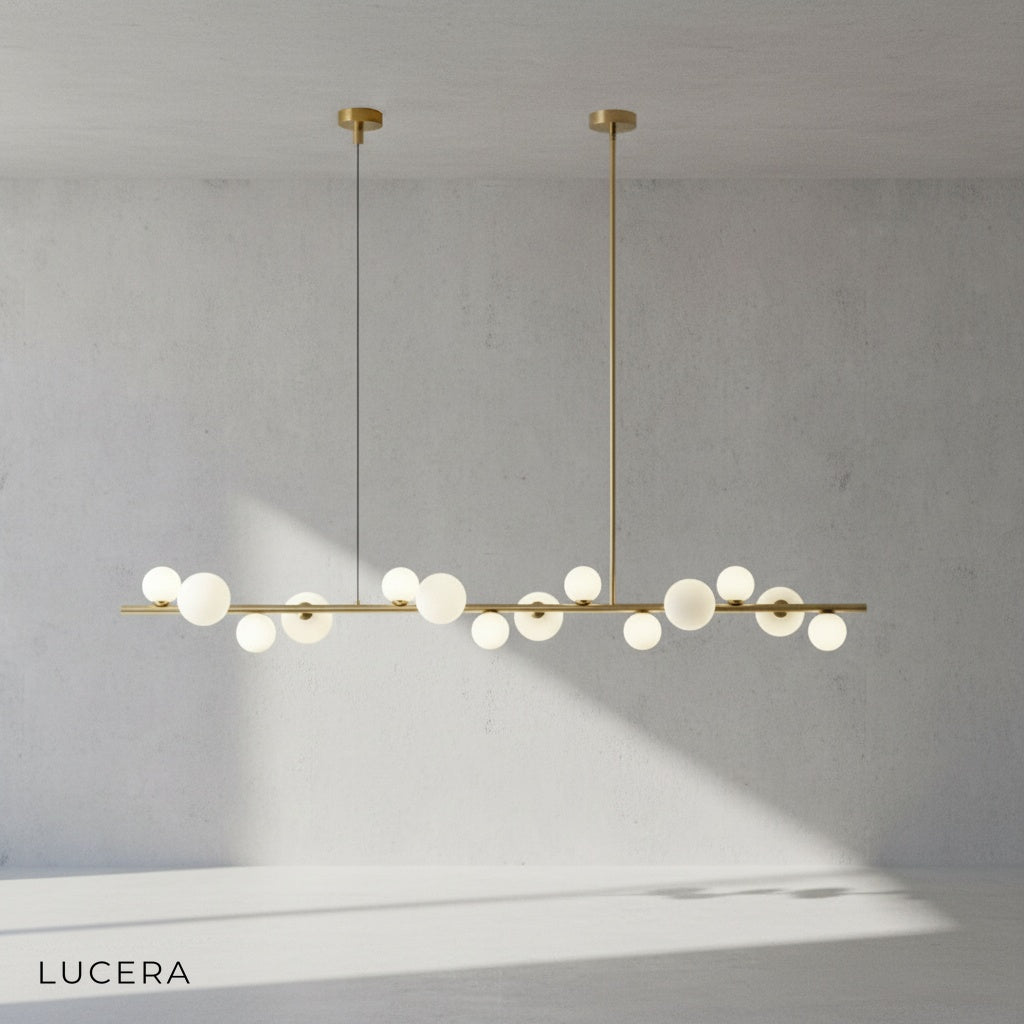 Detail of iron and copper junction on Ran Linear Chandelier with soft light glow