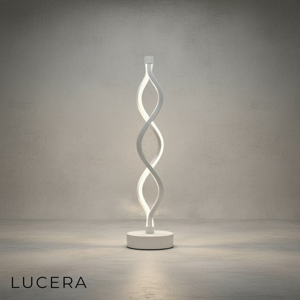 Warm glow of spiral LED table sconce on bedside table in cozy bedroom at dusk
