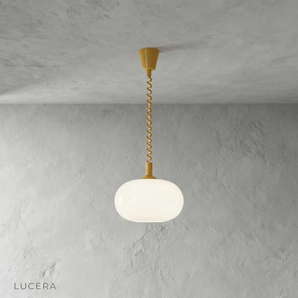 Xanthous pendant light at mid-height in bright living room with neutral decor