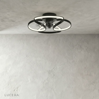 close-up of integrated LED light panel on white ceiling fan fixture