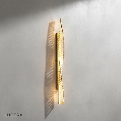 studio shot of Marcato Nordic LED wall light with metal frame finish