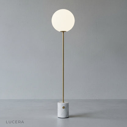 Quentin Floor Lamp in bedroom corner casting soft ambient light