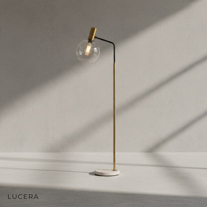 Geneva floor lamp with three glass globes in soft daylight studio