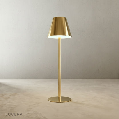 detail of yellow table lamp wrought iron construction with smooth matte finish