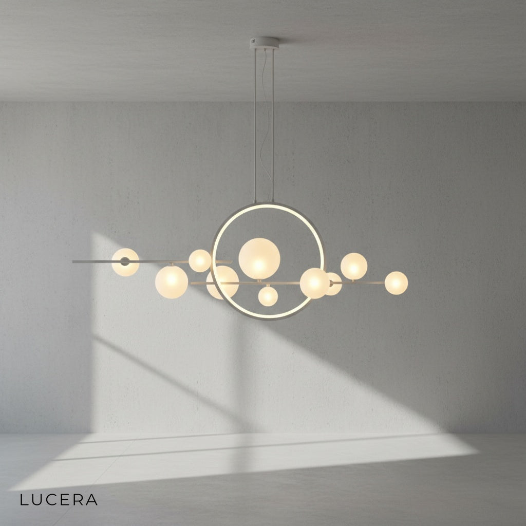 Vor chandelier with adjustable cords at different heights in bright studio setting