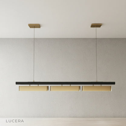 Fiorella Chandelier in dining room above wooden table casting even diffused light on space