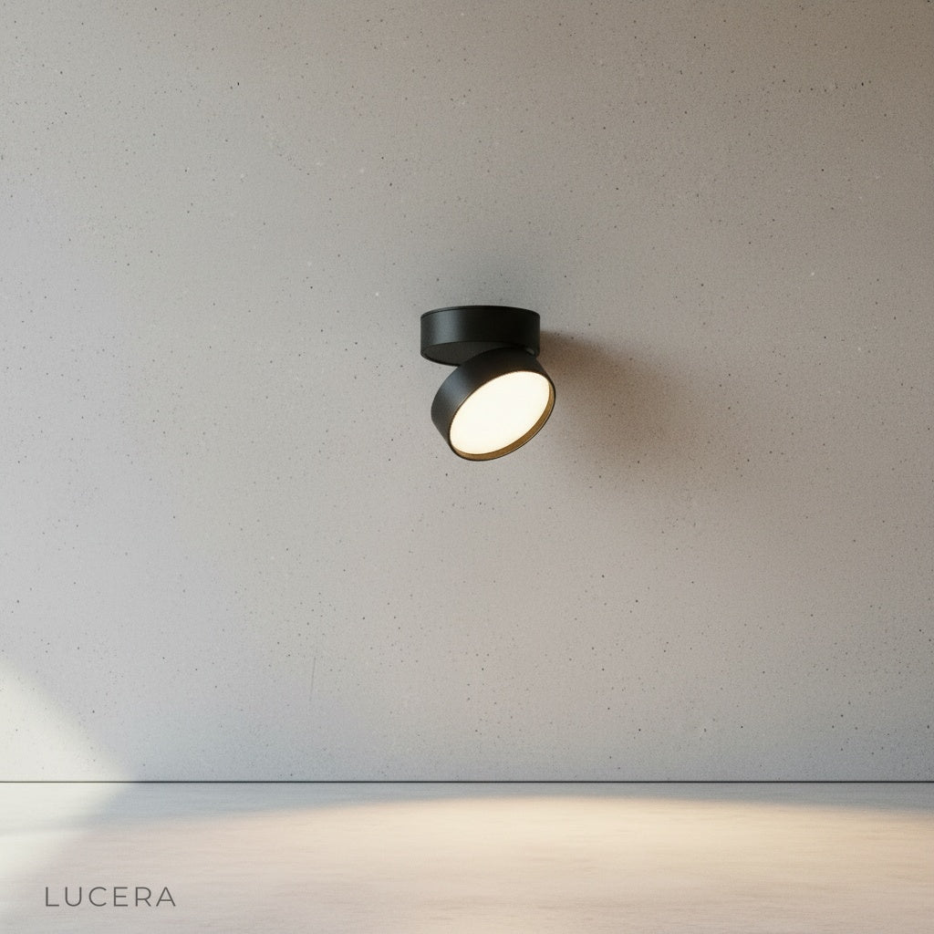 brushed aluminum downlight detail with visible heat sink fins
