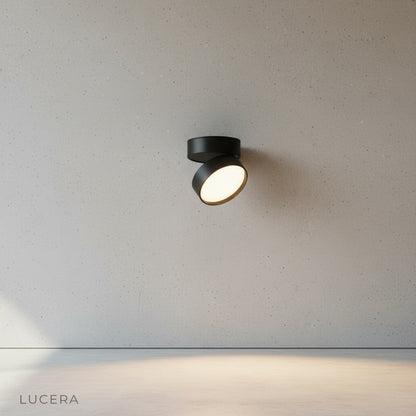 brushed aluminum downlight detail with visible heat sink fins