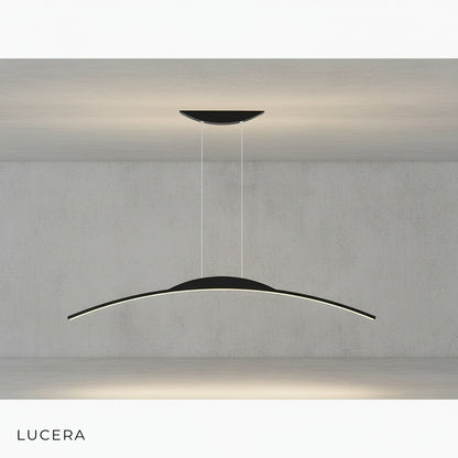 Black chandelier suspended over a kitchen island in a contemporary home