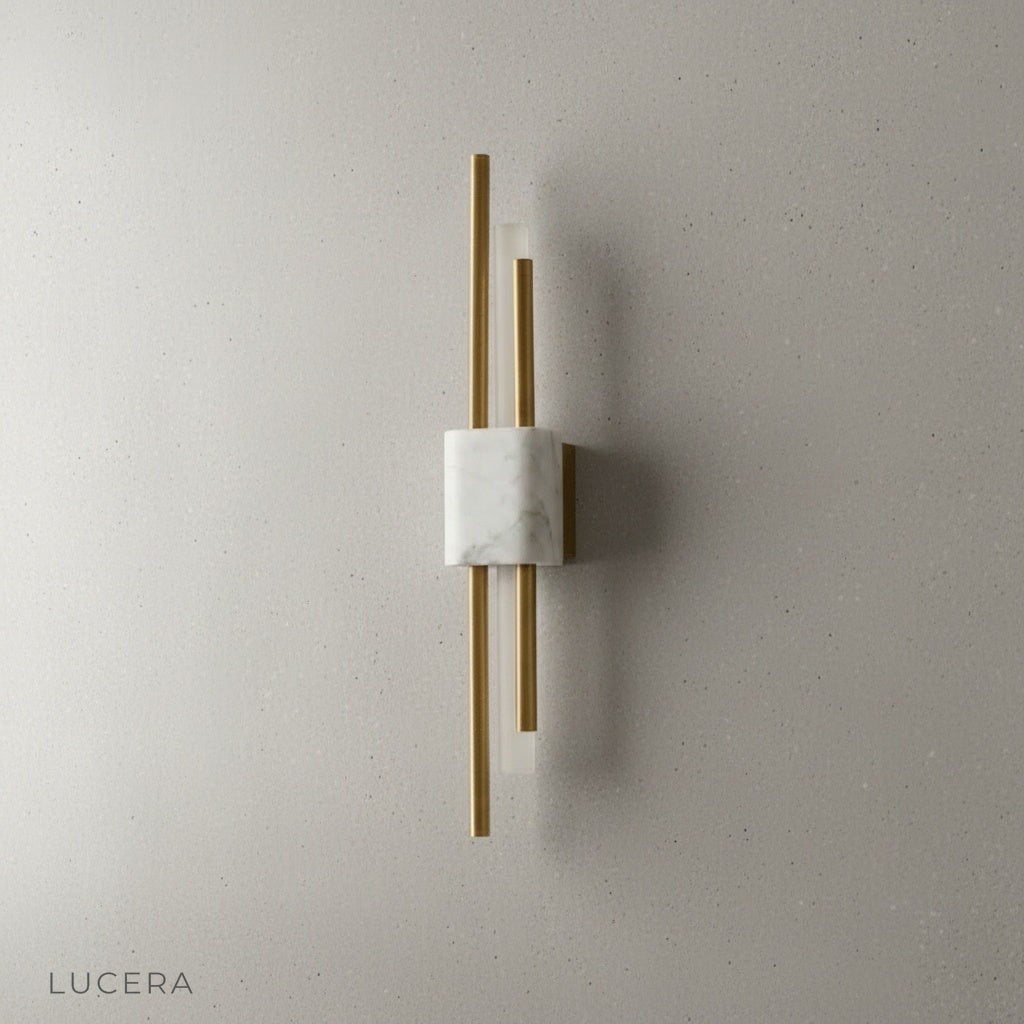 Xyloid wall lamp in crisp white finish against dark wall for contrast