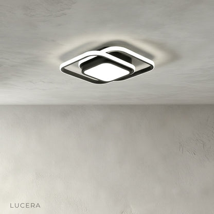 dimmable LED ceiling light in bright white mode suspended over modern dining table with neutral decor