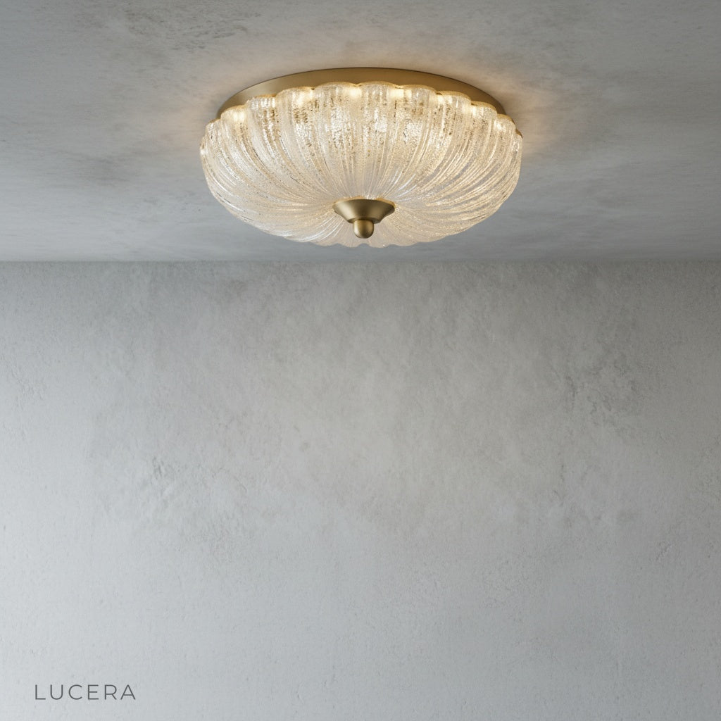 ceiling light with clear glass diffusing bright ambient glow in hallway