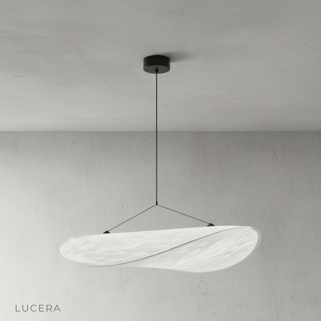 Eridanus pendant light illuminating a cozy dining nook with warm ambient light