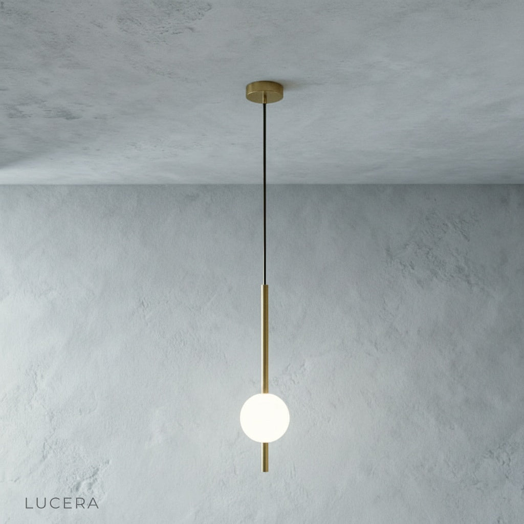 Fjord Sphere Pendant Light over wooden dining table with soft daylight