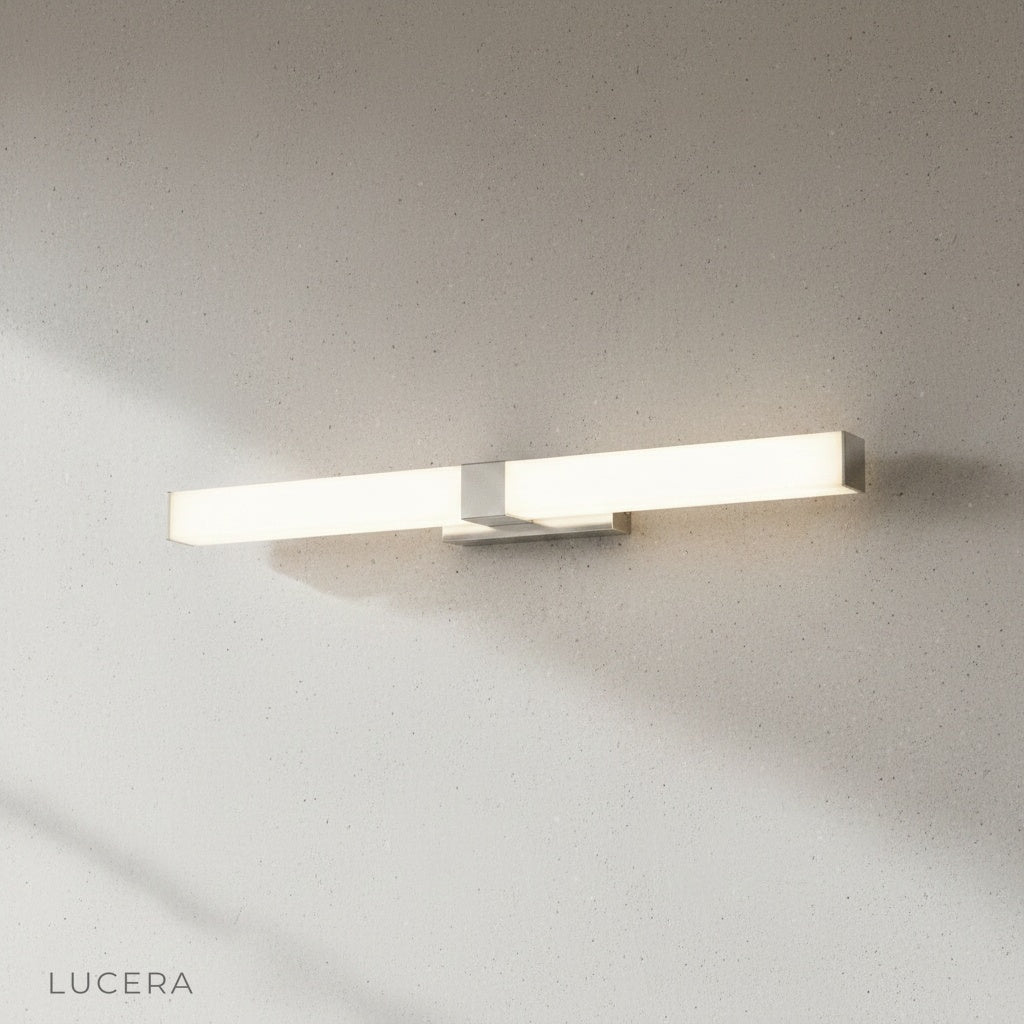 close-up of brushed steel mounting plate and slim lamp body