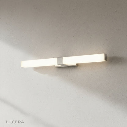 close-up of brushed steel mounting plate and slim lamp body