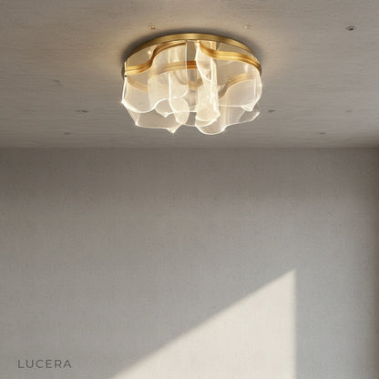 Sisyphus ceiling light in dining room warm ambient illumination