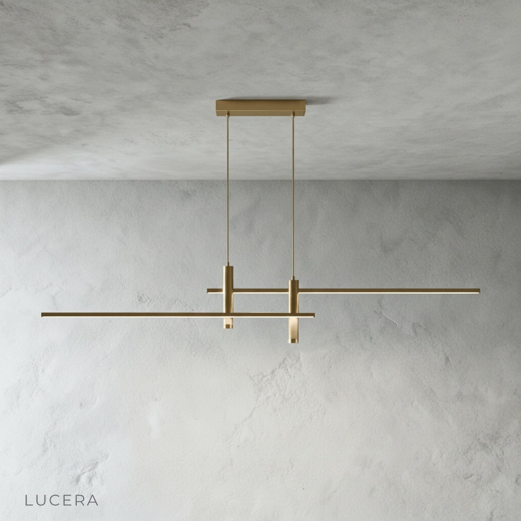 Red pendant lamp illuminating kitchen island with warm glow, contemporary interior