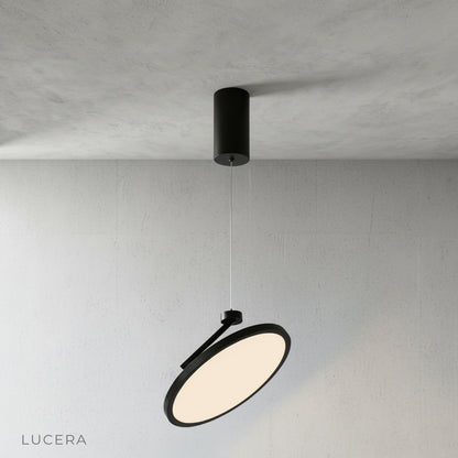 wulfenite pendant light in bright kitchen setting with warm ambient glow from LED panel