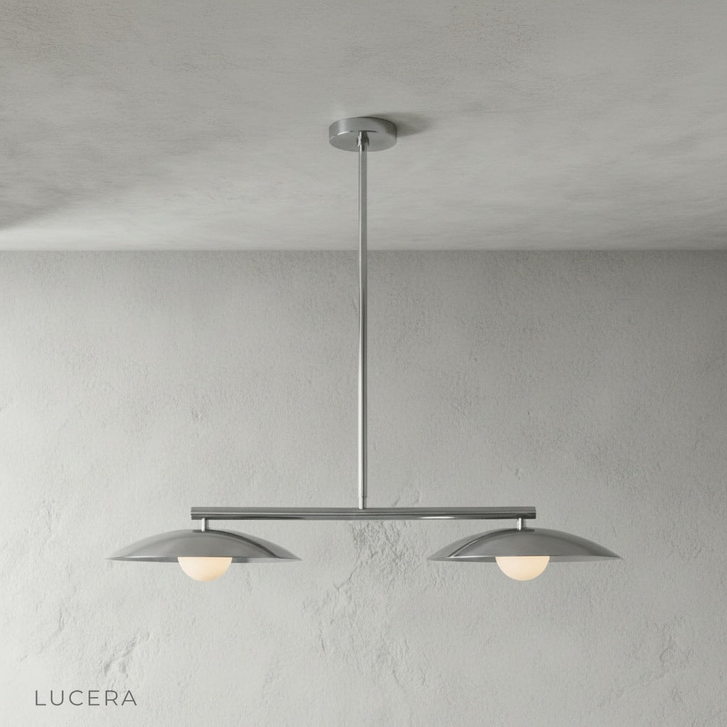 Studio angle from below highlighting the arrangement of curved discs and bulb spacing on the pendant