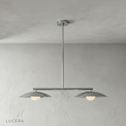 Studio angle from below highlighting the arrangement of curved discs and bulb spacing on the pendant